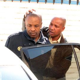 Photo - Home Affairs official arrested