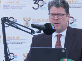 Minister Nel.