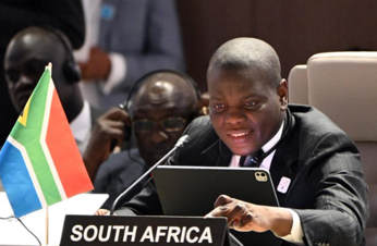 Minister Lamola.